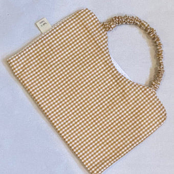 Bavoir cantine petits carreaux beige