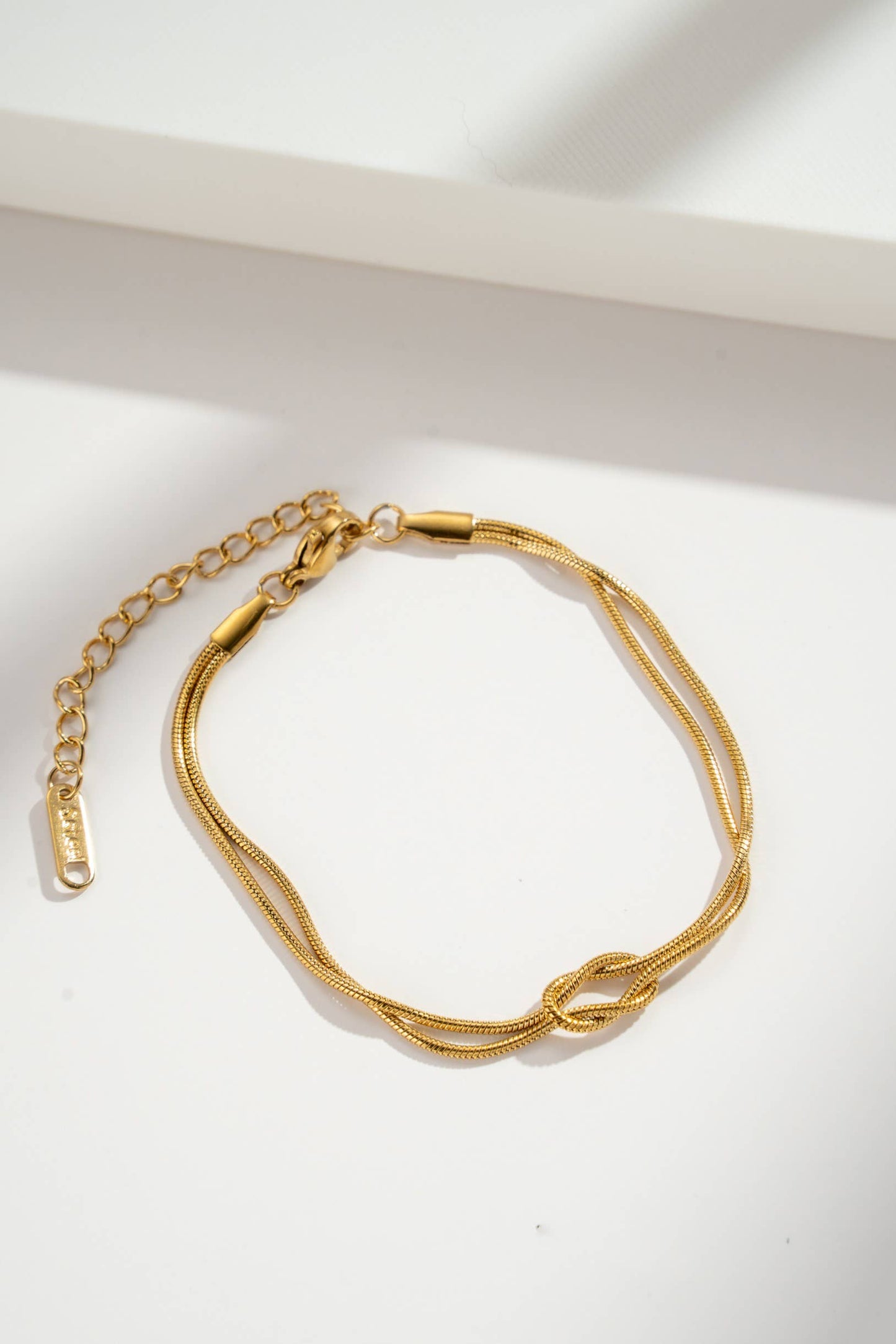 Bracelet double chaîne inoxydable avec nœud élégant