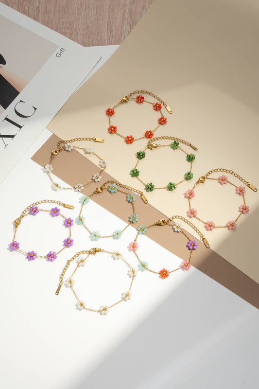 Bracelets fleur dorés perles colorées