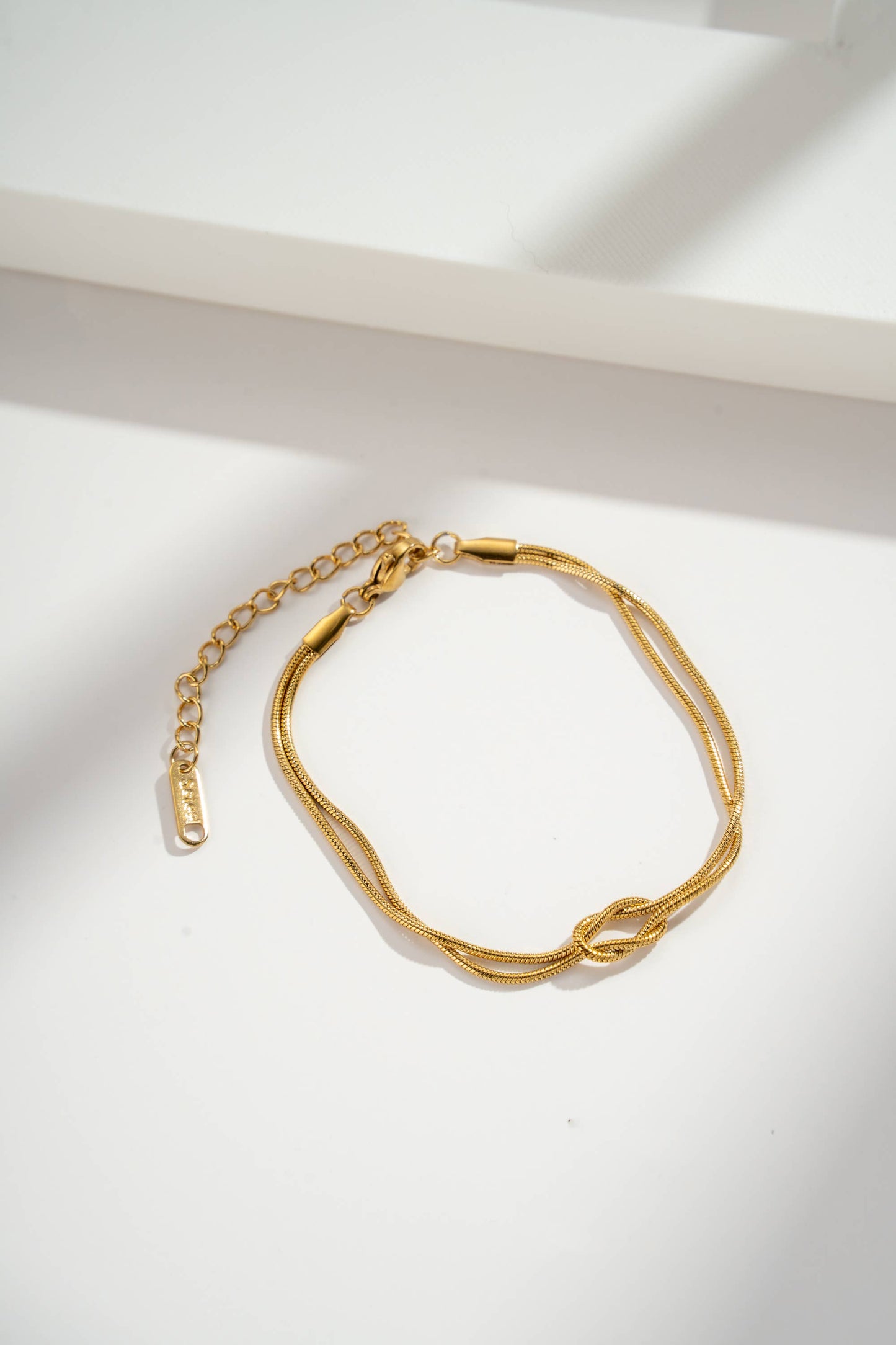 Bracelet double chaîne inoxydable avec nœud élégant